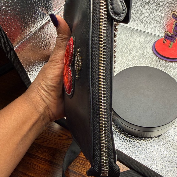 Coach Nolita 19 wristlet/pouch with a red heart appliqué. - Picture 8 of 16
